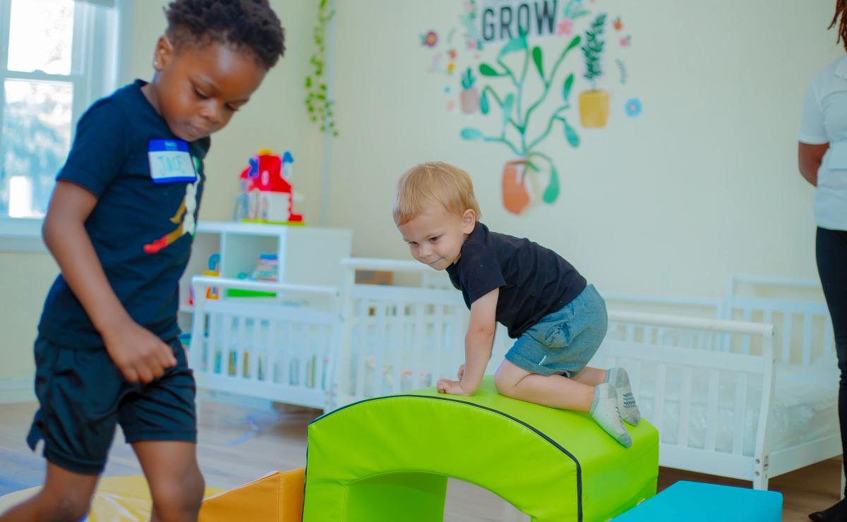 Children playing safely in a clean soft-play classroom at La Distinction Academy