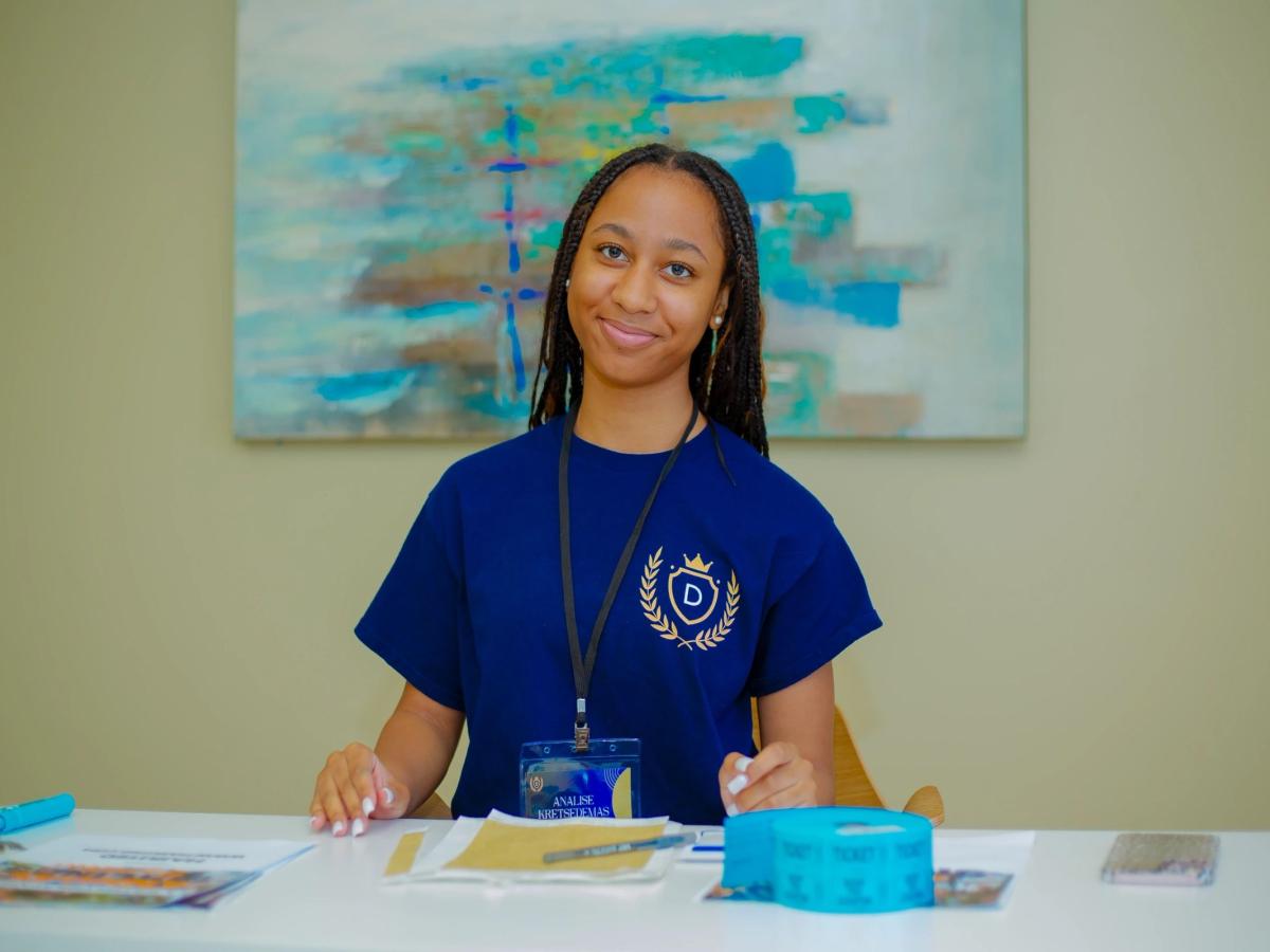 A welcoming educator at La Distinction Academy
